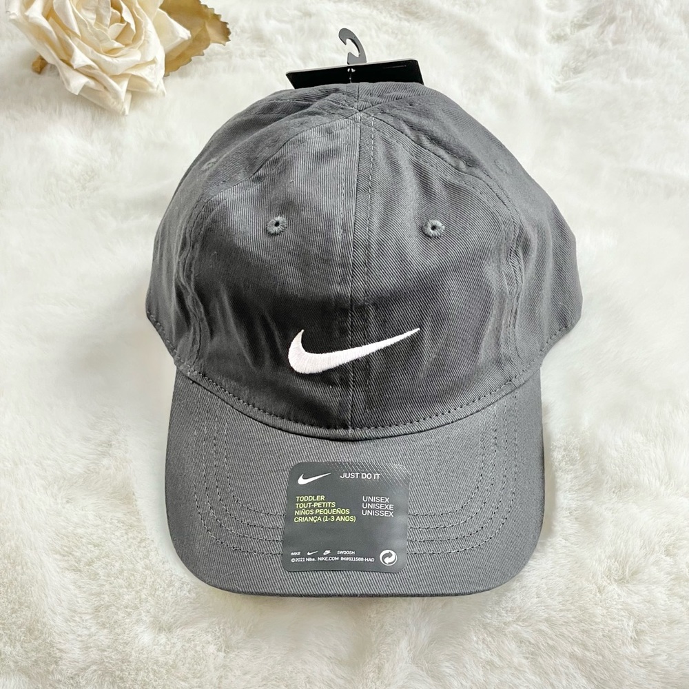 New with tags NIKE TODDLER HAT Grey w/ white logo. Unisex SZ 2/4T Velcro Closure